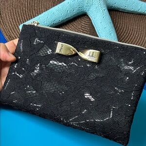 🖤Victoria’s Secret Black lace Mini clutch with a Gold ribbon 🎀 accent